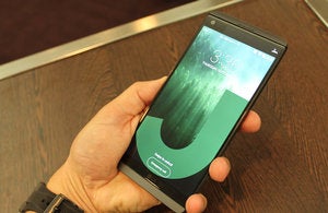 lg v20 signature wallpaper in hand